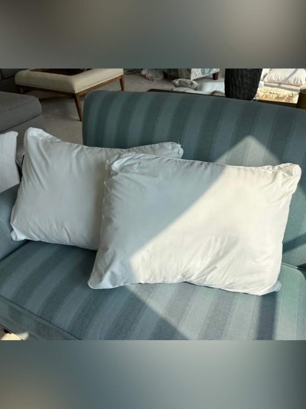 2 WHITE BED PILLOWS